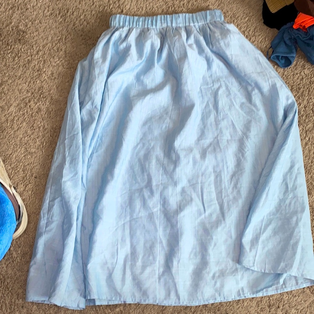Baby blue mid length skirt